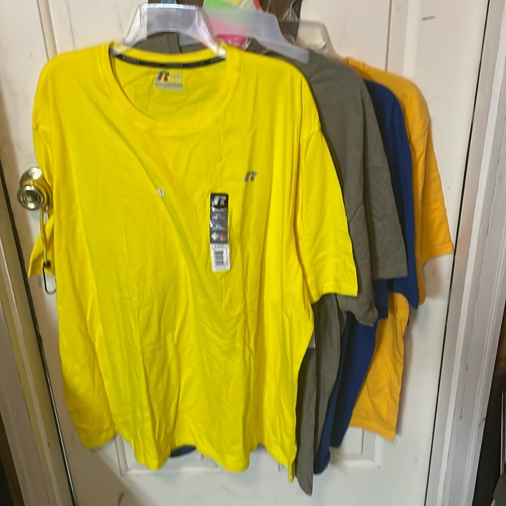 Lot of 4 t shirts 2 yellow, 1 blue, 1 gray